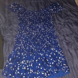 Blue fit and flare off the shoulder floral printed small dress.